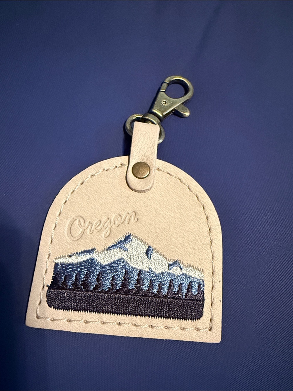 Portland Leather Cream and Blue Mountain Keychain Charm